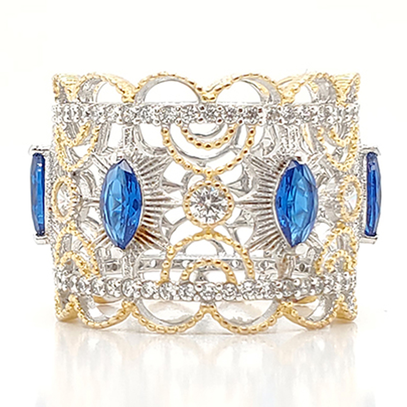 Royal crown type ring with blue gemstone