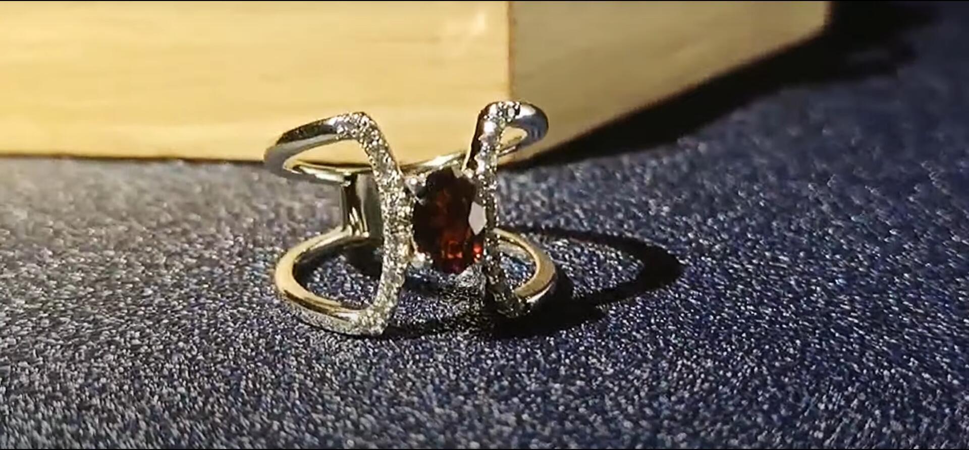Symmetrical curved shape red zircon silver ring