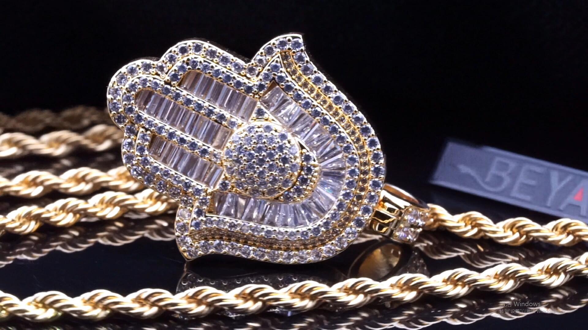 Beyaly Jewelry | Gold-tone custom hip hop CZ iced out micro paved charm hamsa hand pendant