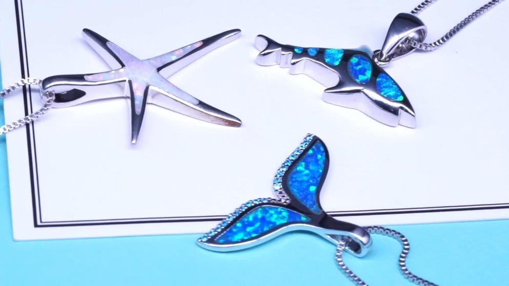 La colección de verano Sterling Silver White Opal Inlay Starfish Colgante